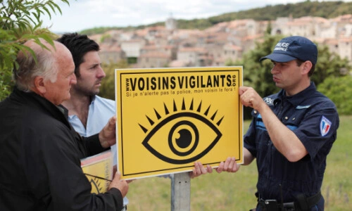 pancarte jaune Voisins Vigilants